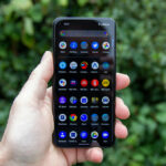 What is the main difference between CNC milling and CNC turning?